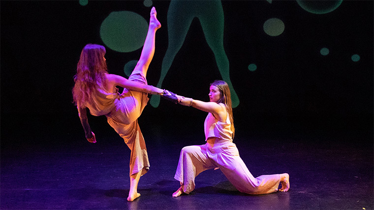 Two students dancing